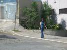 Fernanda walking down Rua Guanhães